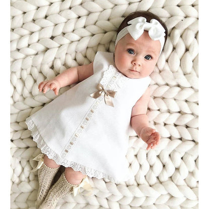 The Seraphina Eyelet Flutter Dress